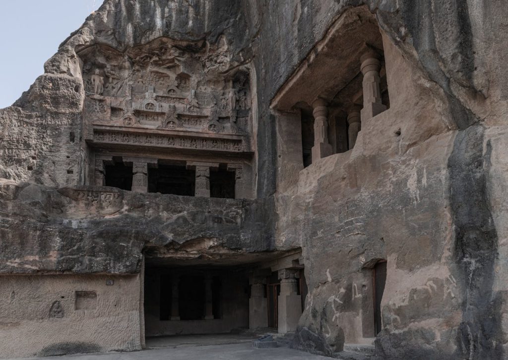 Discover the intricate rock-cut architecture of the ancient Ellora Caves in Maharashtra, India.